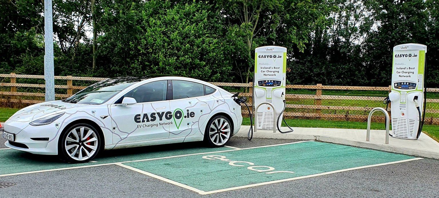 Electric vehicle being charged at an EasyGo charging station